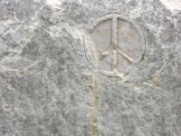 Peace symbol, detail, stone carvings, Fullerton Avenue at Lake Michigan