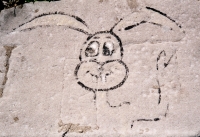 Rabbit. Lost. Chicago lakefront stone paintings, between Belmont and Diversey Harbors. 2002