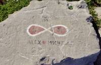June 1994, 69 within infinity symbol, Alex hearts Michelle, JSI, CD, EDC, L. Chicago lakefront stone paintings, between Belmont and Diversey Harbors. 2015