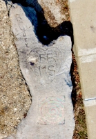 F.B. M.S. in heart, R Goty, with remnant of spiral painting. Chicago lakefront carvings, between Belmont and Diversey Harbors. 2020