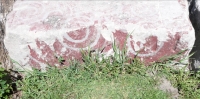 Faded red painting. Chicago lakefront stone painting, between Belmont and Diversey Harbors. 2022