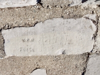 P.R. | G.H., (Unknown) + Joyce (first name scratched out). Chicago lakefront stone carvings, Diversey Harbor. 2019