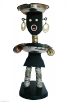 Long-necked black bottle-cap figure with skirt-shaped body - vernacular art