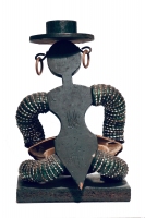 Seated black bottle-cap figure with hat, rear view - vernacular art