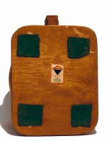 Junior Achievement label on copper-colored bottle-cap figure - vernacular art