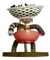 Bottle-cap figure with big white bowl on head, a hanging cowbell and a post supporting lower bowl - vernacular art