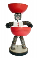 White bottle-cap figure with tapered body, painted face  and support wire - vernacular art