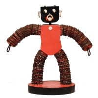 Red bottle-cap figure with painted mouth and no bowls- vernacular art