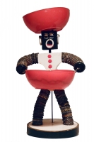 White bottle-cap figure with tapered body, painted face  and support wire - vernacular art