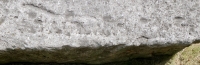 Indecipherable, detail. Chicago lakefront stone carvings, behind McCormick Place. 2021