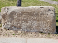 Possibly a skull (sideways here, slightly to right of center). Chicago lakefront stone carvings, Oakwood Beach. 2019