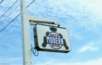 A really amazing logo. Modern Auto Repair, Muskegon, Michigan-Roadside Art