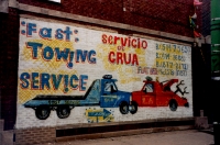 Two tow trucks and much writing. D&A Auto Body Repair, Western Avenue and 47th Street-Roadside Art-Roadside Art
