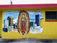 The combination of religious and urban imagery is swell on its own. The figure underneath the virgin caps off this masterwork. Latino's Auto, Federal Blvd., Denver, Colorado