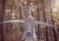 Bull rider. "Do not touch or swing on statues." E.T. Wickham site, 1995.