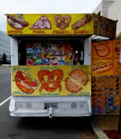 Hot dog, pizza, pretzel, egg roll, pizza. Vernacular hand-painted food truck signage, National Mall, Washington, D.C.