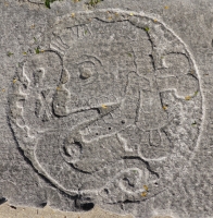 Mesoamerican skull  mythological figure. Foster Avenue Beach vernacular stone carving