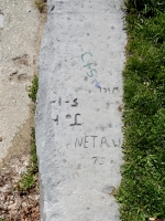 Netaw 75, Joh- 5-1-, Will. Chicago lakefront stone carvings, between Foster Avenue and Montrose. 2019