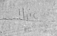HHL + C, "BC". Chicago lakefront stone carvings, between Foster Avenue and Montrose. 2017
