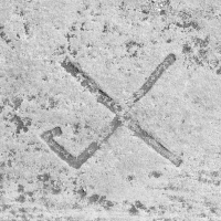 Cross-like symbol. Chicago lakefront stone carvings, between Foster Avenue and Montrose. 2017