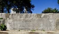 Wide panel with Mesoamerican imagery. Chicago lakefront stone carvings between Foster Avenue and Bryn Mawr. 2013