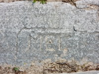 Mel. Chicago Lakefront stone carvings, between Foster Avenue and Bryn Mawr. 2017