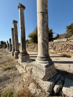 Line of pillars, with cross graffiti on first one, Perge.