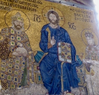Emperor Costantine IX Monomachos, Jesus and the Empress Zoe. They are donating money to Hagia Sophia, 11th Century. Earlier faces were scraped off and replaced