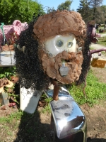 Bearded man with pipe in Jack Barker\'s yard