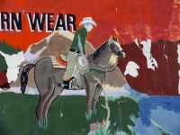 Roadside art: Jessicas Fashion ghost riders on sign, 2010