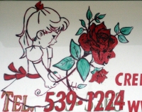 Sign drawing of girl holding a large rose, Tito's Flowers and Gifts