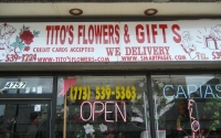 Sign for Tito's Flowers and Gifts