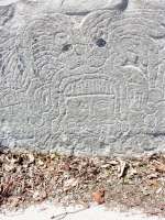 Wide panel with Mesoamerican imagery, detail. Chicago lakefront stone carvings between Foster Avenue and Bryn Mawr. 2013