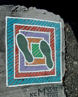 Feet on colorful grid, painted 1993, refreshed in 1997 and 2003. Chicago lakefront stone paintings, south of Montrose Harbor. 2003