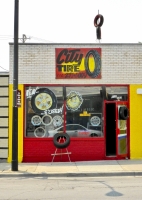 City Tire, Lincoln Avenue near Carmen. As if the painting and the colors weren't cool enough, they had to add the sculpture atop the building