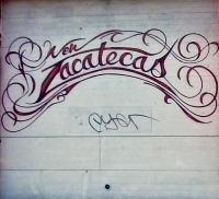Fancy hand-painted script on garage door. New Zacatecas, Kedzie Avenue and 38th Place