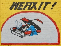 We Fix It! with car under repair wall painting. Frank's West Side Auto Parts, Kedzie at 30th Street