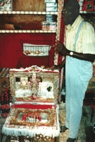 Rev. Dennis showing off the Ark of the Covenant at Margaret's Grocery, Vicksburg