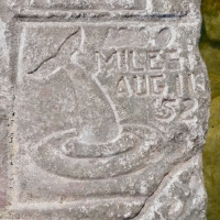 1200(?) Miles Aug 11 1952, diving whale, from 12-panel carving. Chicago Lakefront stone carvings, south of La Rabida Hospital. 2023