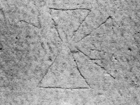 Incomplete Maltese cross. Lost. Chicago lakefront stone carvings, south of Montrose Harbor. 2003