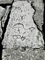 Autograph rock: Flapper, Hook, Boob, Dean, AD, John and others. Lost. Chicago lakefront stone carvings, south of Montrose Harbor. 2003