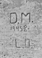 1945-8, D.M. - L.O. Lost. Chicago lakefront stone carvings, south of Montrose Harbor. 2013