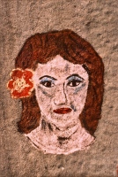 Portrait of woman with flower in her hair. Aron Packer photo. Chicago lakefront rock paintings, Montrose Harbor. 1991