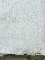 Roberto XE. Chicago lakefront stone carvings, near Montrose Beach. 2023