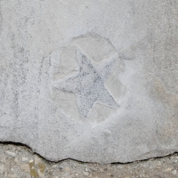 Star, carved by Don Di Sante, detail. Chicago lakefront stone carvings, Montrose Beach. 2022