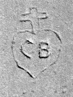 CB, heart with cross. Chicago lakefront stone carvings, south of Montrose Harbor. 2008. Still visible