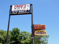 Fred's Auto, Milwaukee. A swarm of typography for the strong man