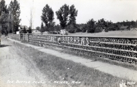 Henry Stephens' Bottle Fence, Waters, Michigan, postcard