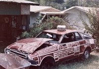 Wrecked car at Howard Finster's Paradise Garden, circa 1990