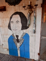 Painting on front of the shop buildling at the entrance to Howard Finster's Paradise Garden in 2016